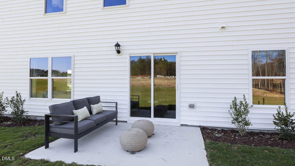 113 Ross Drive Stem, NC 27581 - Photo 38 of 42 a building outdoor space with patio