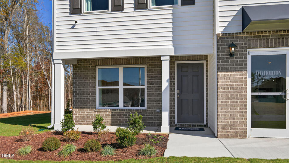 113 Ross Drive Stem, NC 27581 - Photo 4 of 42 a view of a house with brick walls