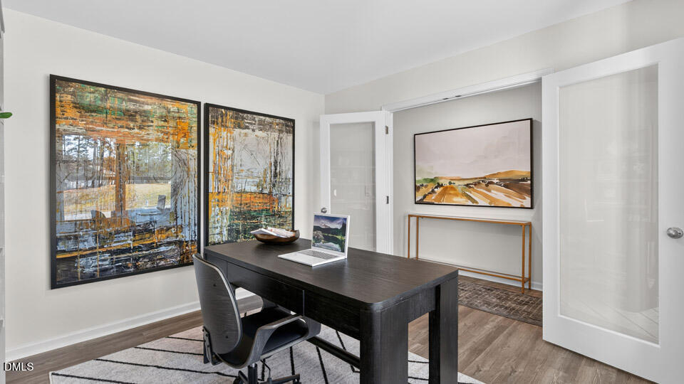 113 Ross Drive Stem, NC 27581 - Photo 9 of 42 a view of a workspace with furniture and window