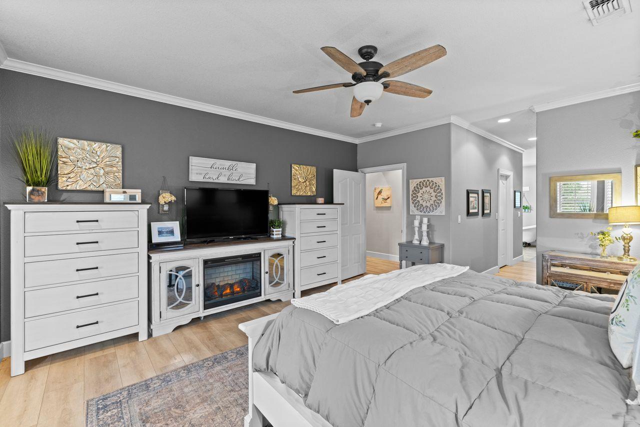 3302 Bear River Drive Rio Oso, CA 95674 - Photo 17 of 50 a spacious bedroom with a bed and a flat screen tv