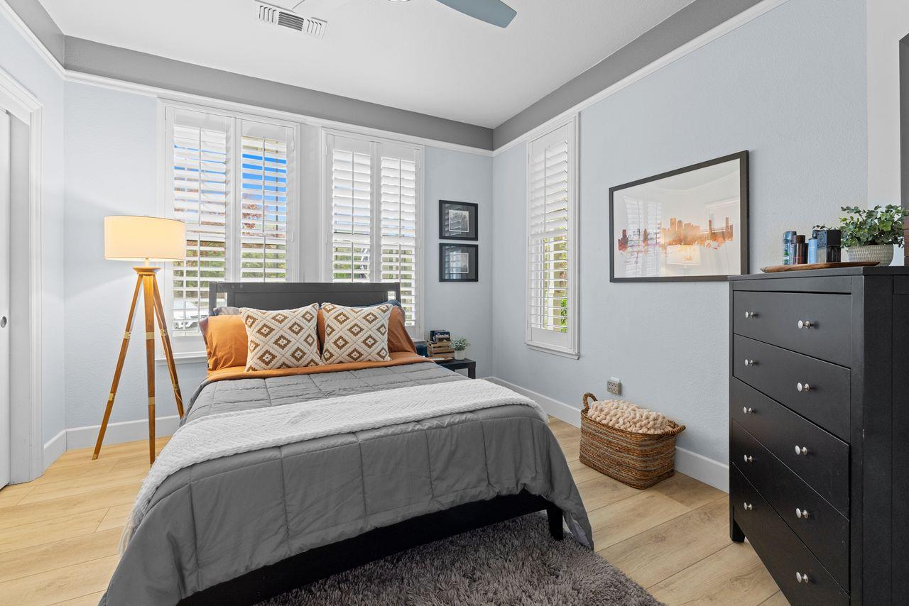 3302 Bear River Drive Rio Oso, CA 95674 - Photo 22 of 50 a bedroom with a bed and a painting on the wall