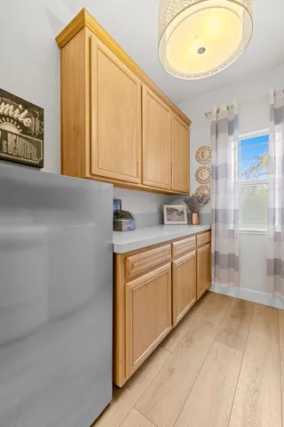 a view of a kitchen with electric appliances