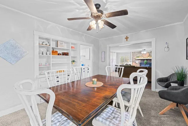 a kitchen with a cabinets and window