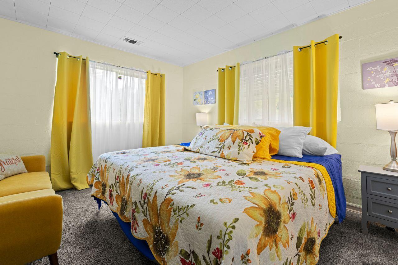 3302 Bear River Drive Rio Oso, CA 95674 - Photo 42 of 50 a bedroom with a bed and wooden floor