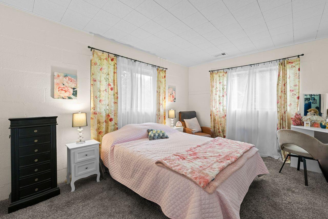 3302 Bear River Drive Rio Oso, CA 95674 - Photo 43 of 50 a bedroom with a bed and a dresser next to a window