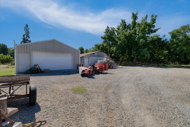 an aerial view of residential house with outdoor space