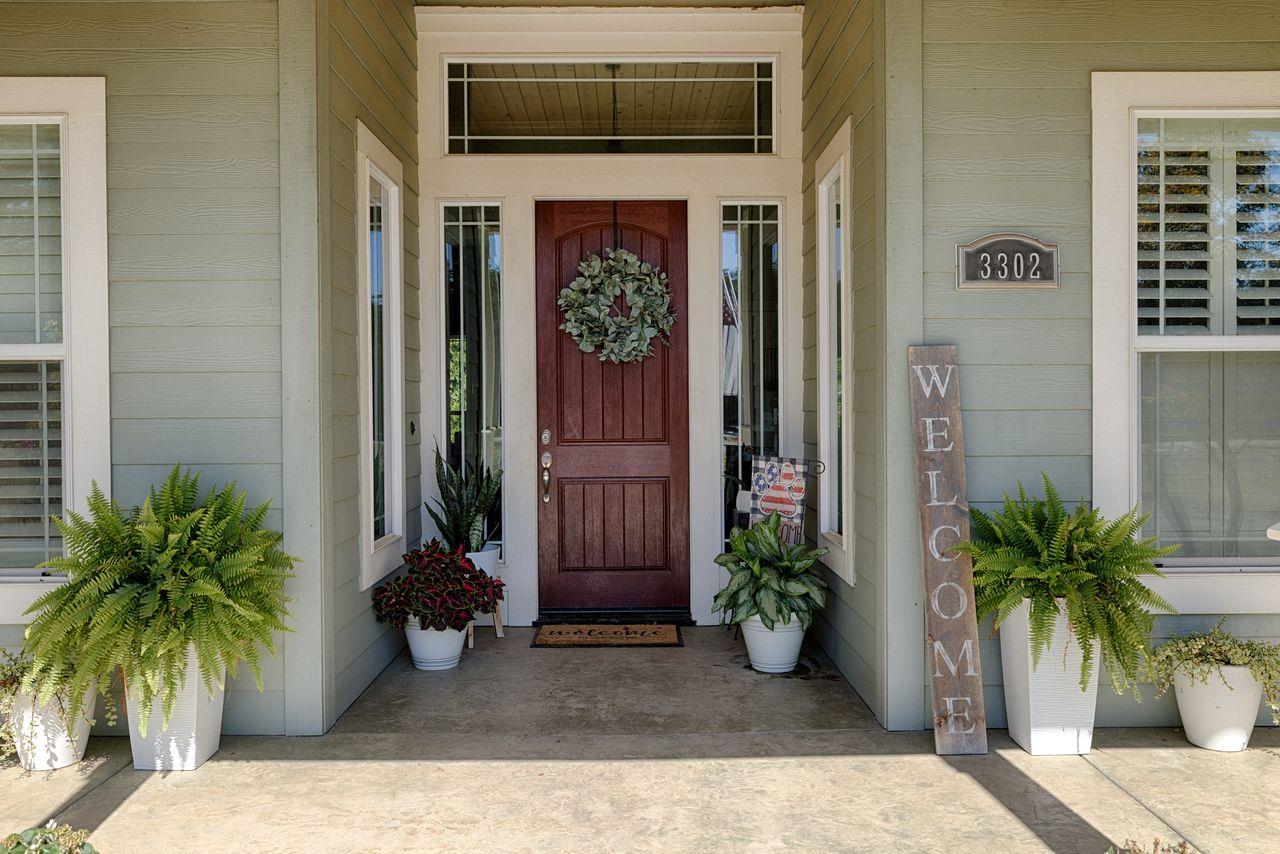 3302 Bear River Drive Rio Oso, CA 95674 - Photo 5 of 50 a potted plant in front of a door