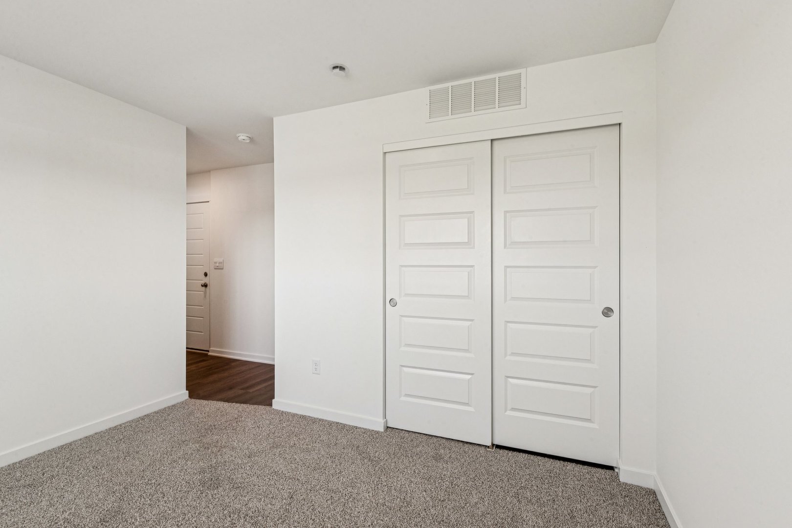 6530 Linden Trail, Unit C Wonder Lake, IL 60097 - Photo 26 of 27 an empty room with closet