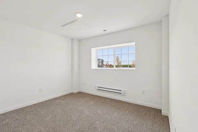 a view of a livingroom with an entryway