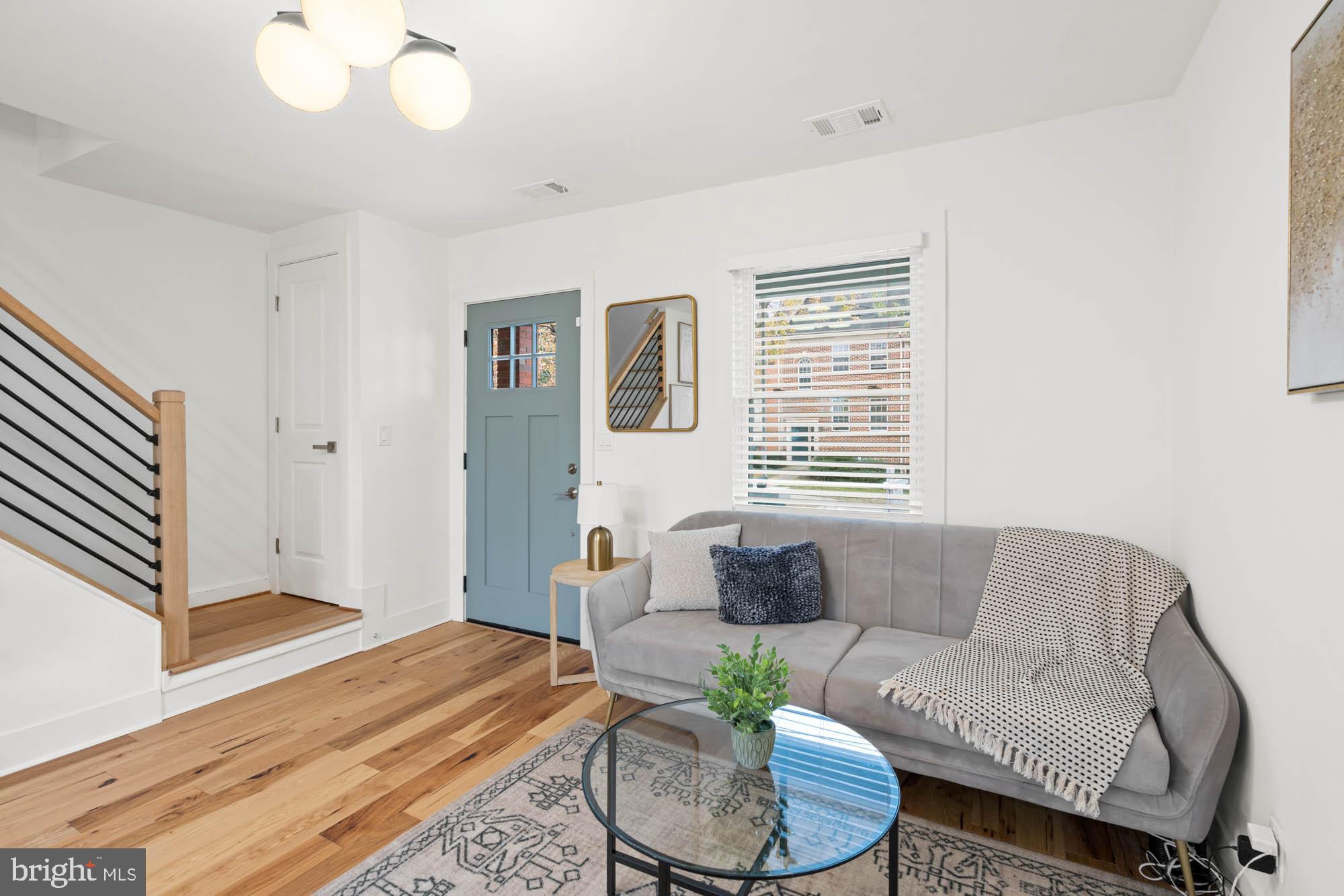 1458 Howard Road Southeast Washington, DC 20020 - Photo 19 of 49 a living room with furniture and a large window