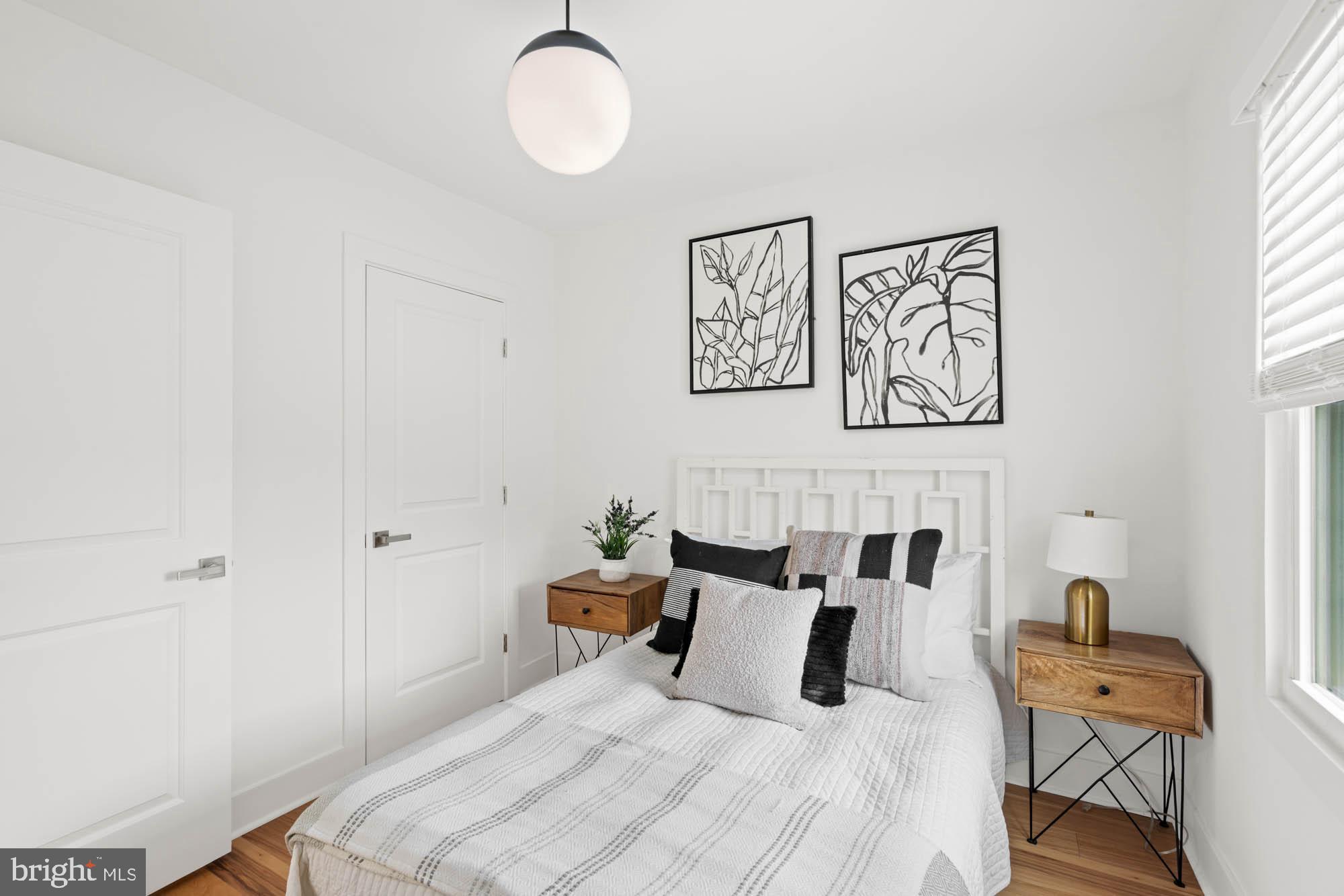 1458 Howard Road Southeast Washington, DC 20020 - Photo 28 of 49 a bed room with a bed and chair