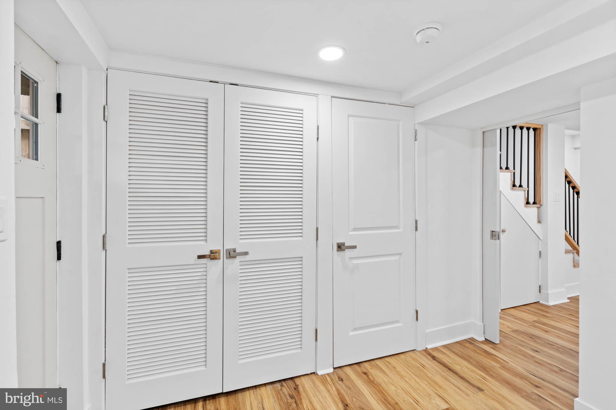 1458 Howard Road Southeast Washington, DC 20020 - Photo 42 of 49 a view of a livingroom with wooden floor and closet area