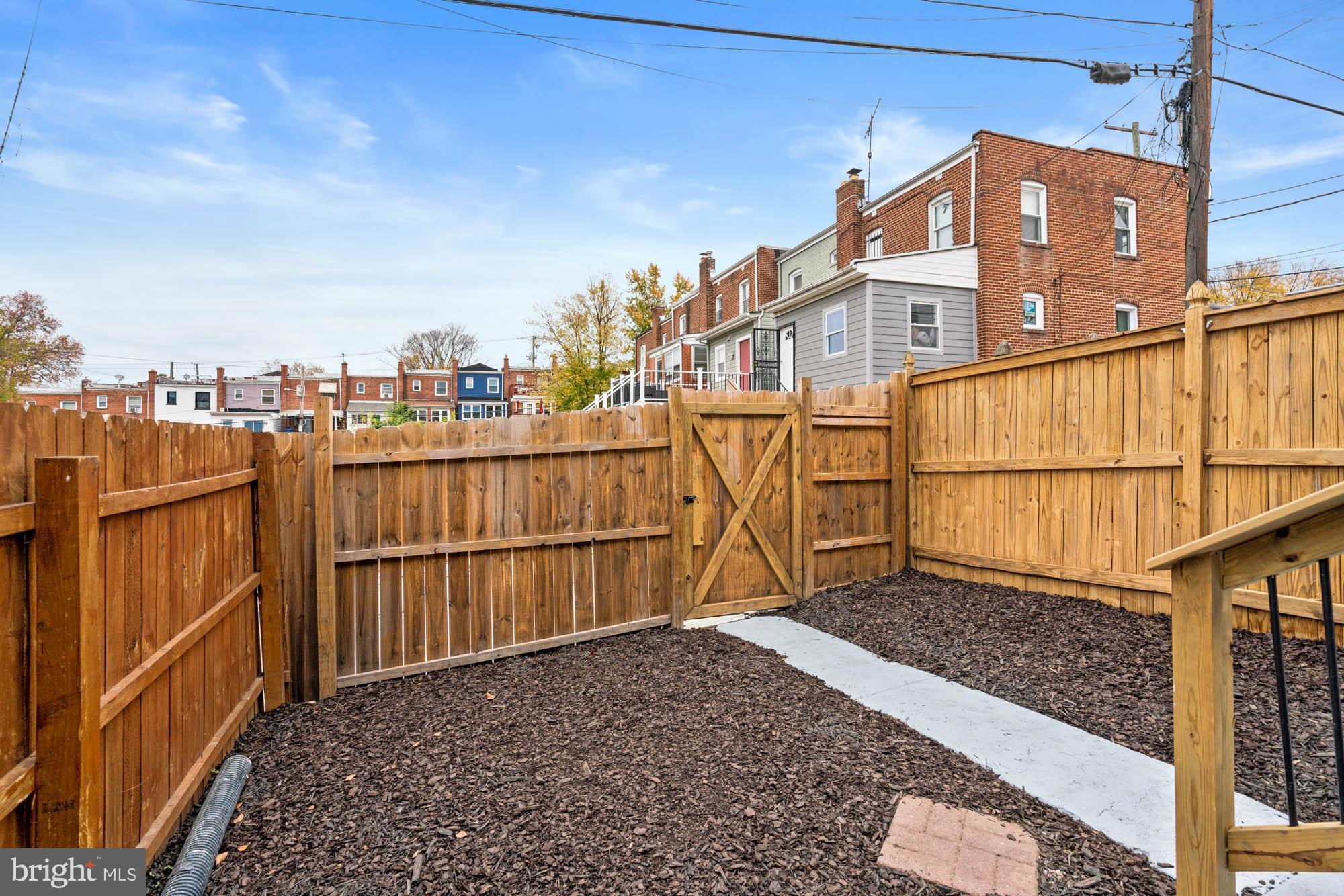 1458 Howard Road Southeast Washington, DC 20020 - Photo 46 of 49 a view of a balcony with wooden fence