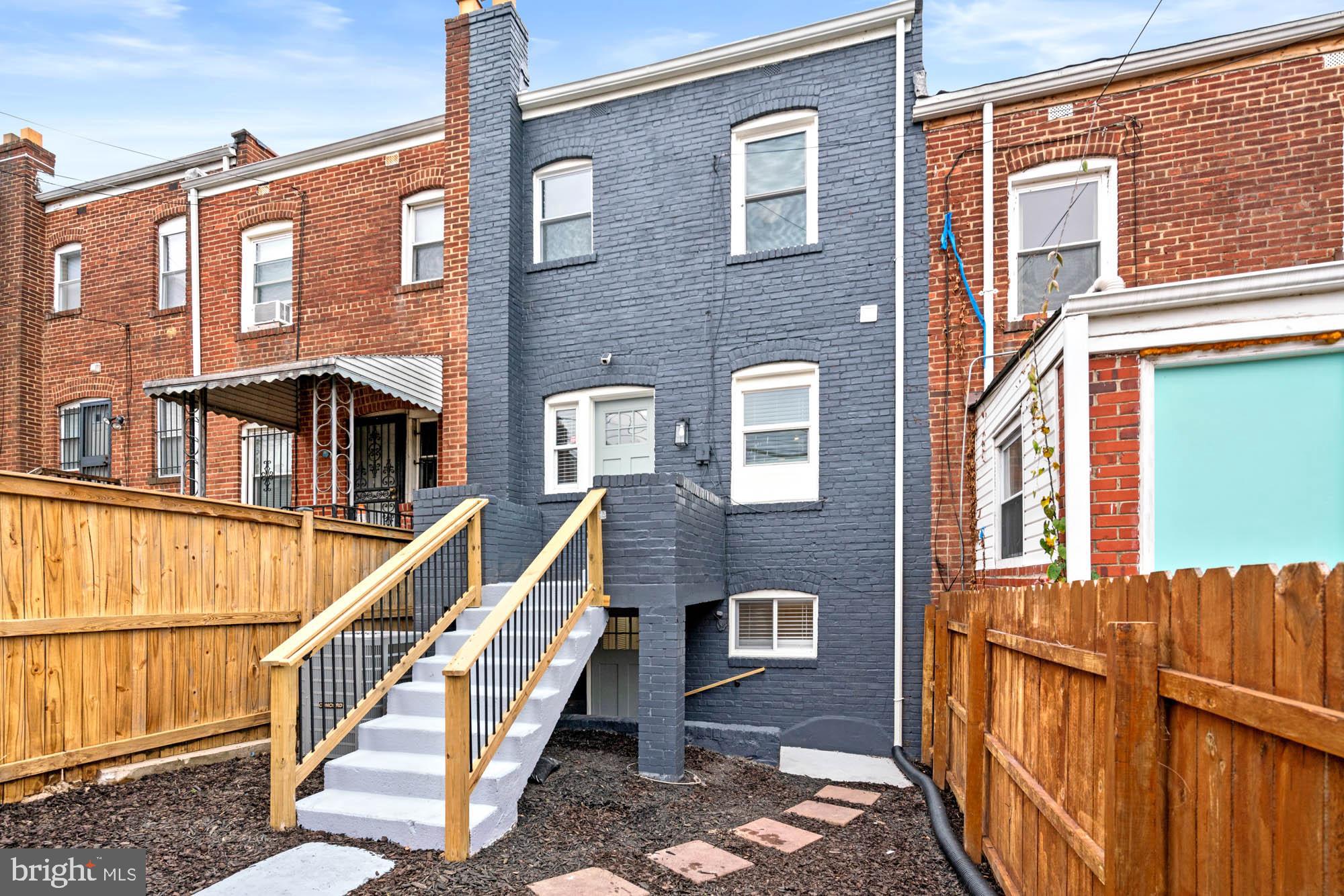 1458 Howard Road Southeast Washington, DC 20020 - Photo 47 of 49 a view of a brick building with many windows