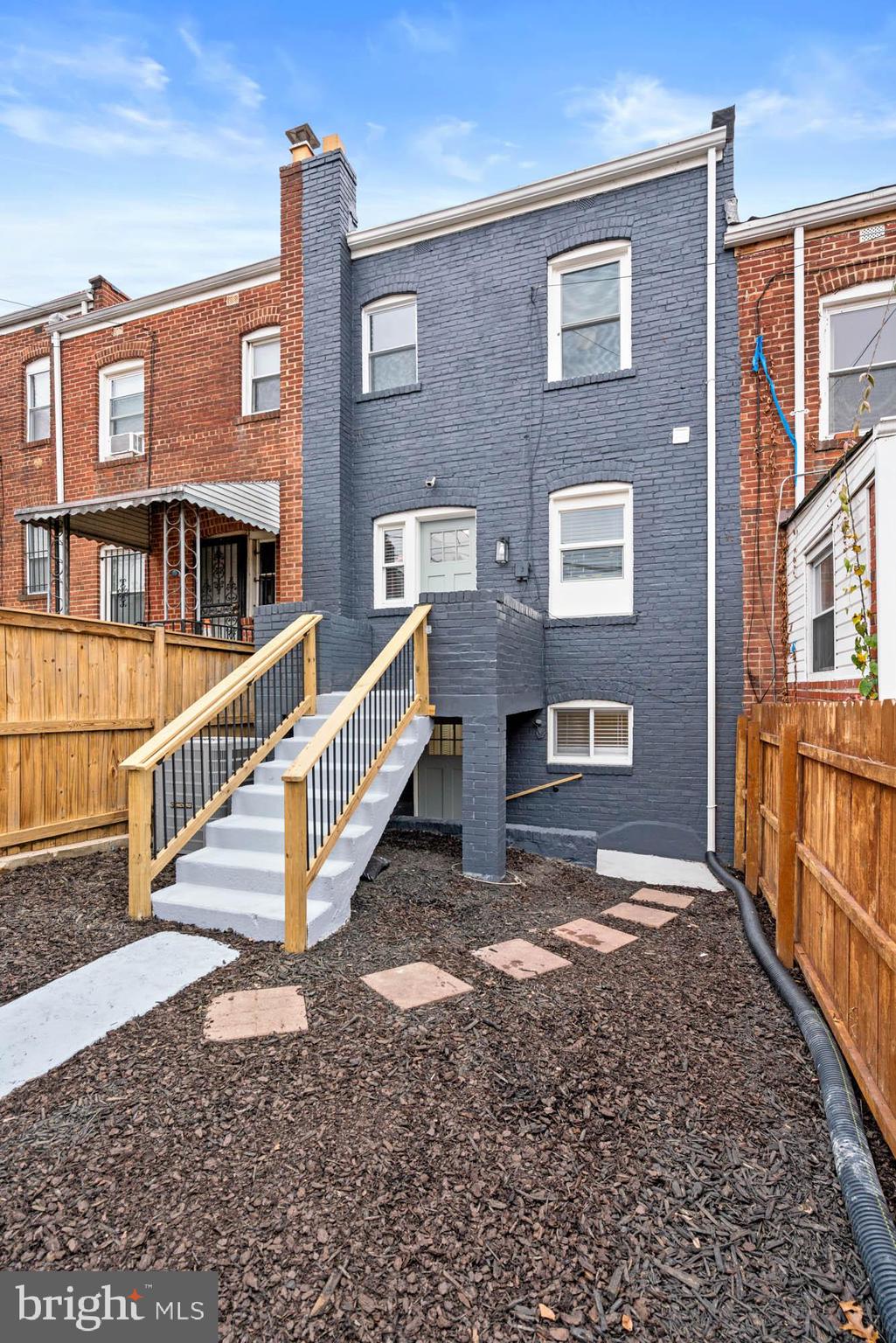 1458 Howard Road Southeast Washington, DC 20020 - Photo 48 of 49 a view of front of a house with a yard