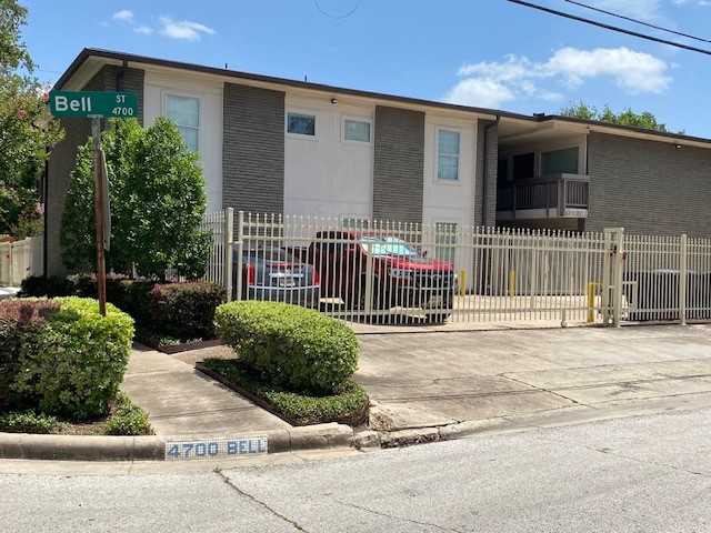 4701 Bell Street, Unit 10 Houston, TX 77023 - Photo 19 of 19 a view of a house with a small yard and plants