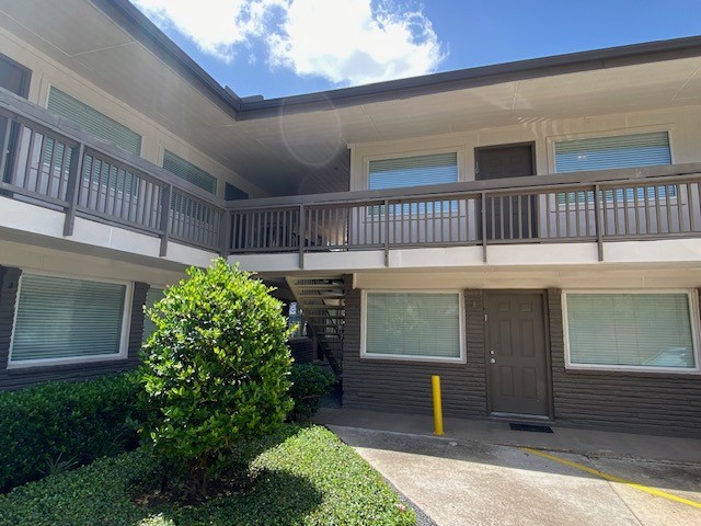 4701 Bell Street, Unit 10 Houston, TX 77023 - Photo 2 of 19 a house view with a garden space