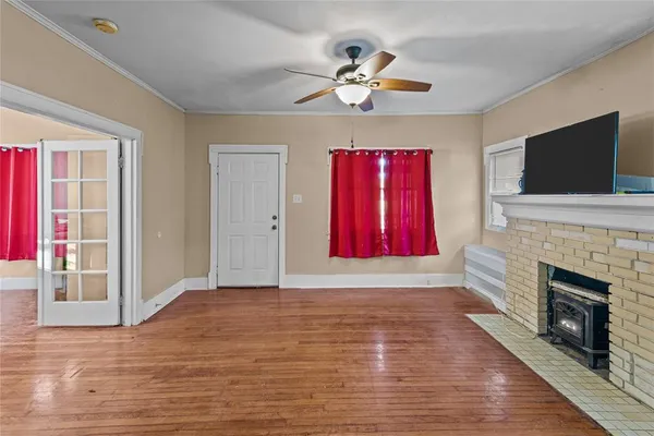 a kitchen with a appliances a sink and a stove