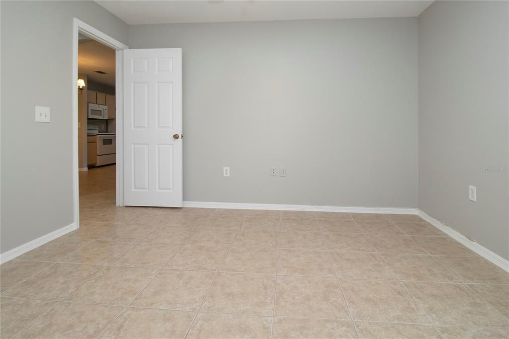 8932 Manor Loop, Unit 104 Lakewood Ranch, FL 34202 - Photo 11 of 35 an empty room with closet area