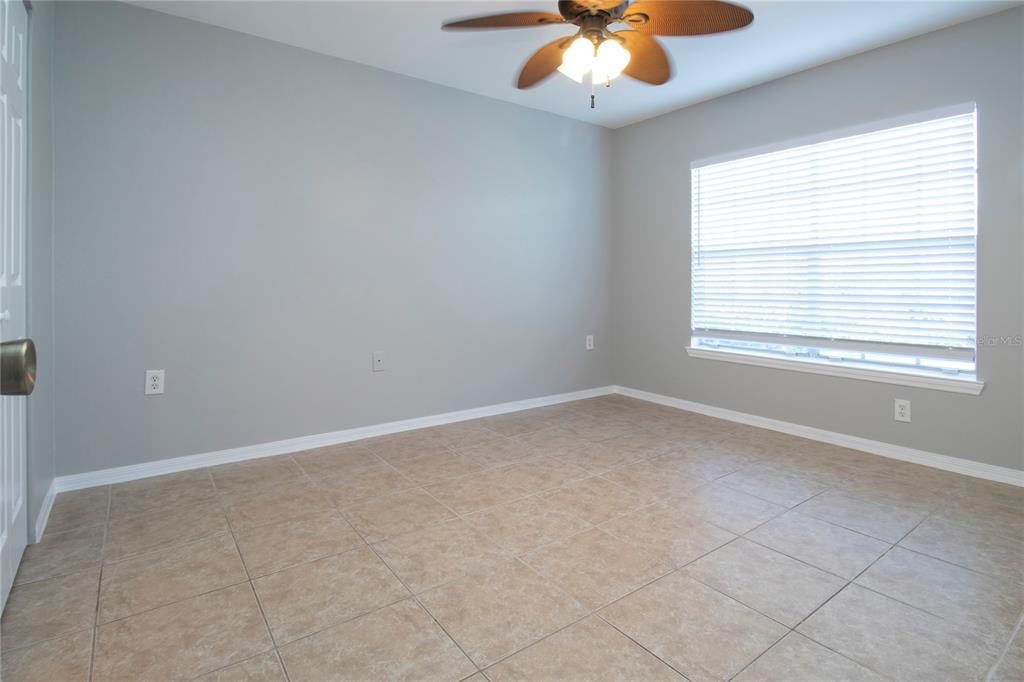 8932 Manor Loop, Unit 104 Lakewood Ranch, FL 34202 - Photo 3 of 35 an empty room with a window
