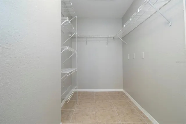 a view of an empty walk in closet