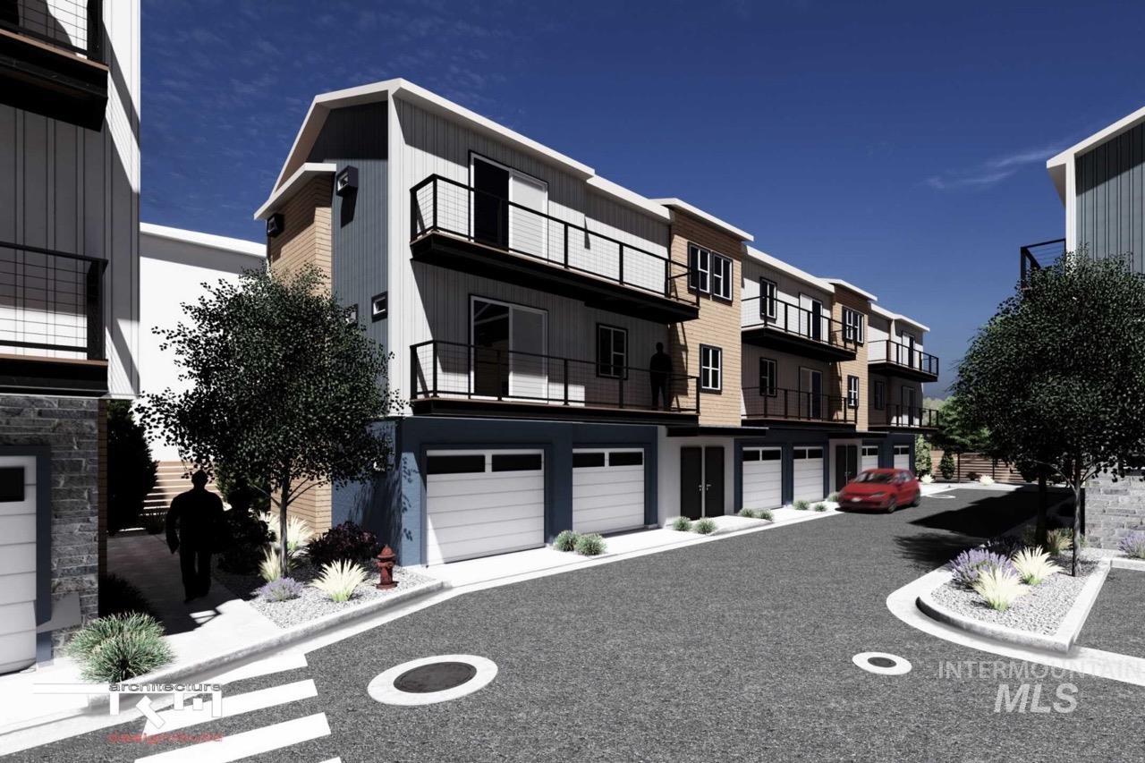 3981 Reed Street Garden City, ID 83714 - Photo 13 of 18 View of building exterior featuring a garage