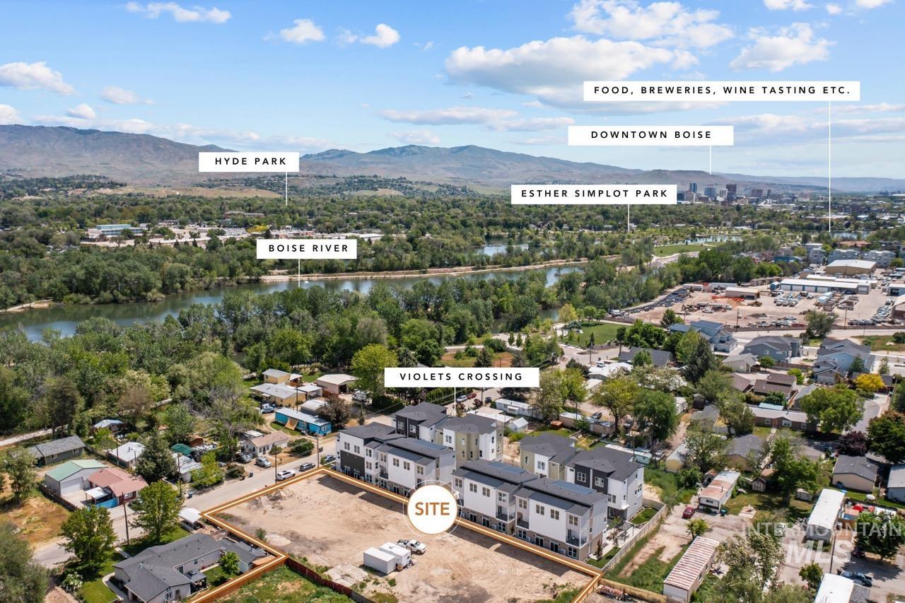 3981 Reed Street Garden City, ID 83714 - Photo 5 of 18 Aerial view of property and surrounding area featuring a water and mountain view and nearby suburban area