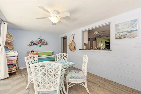 a outdoor living space with furniture and a floor to ceiling window