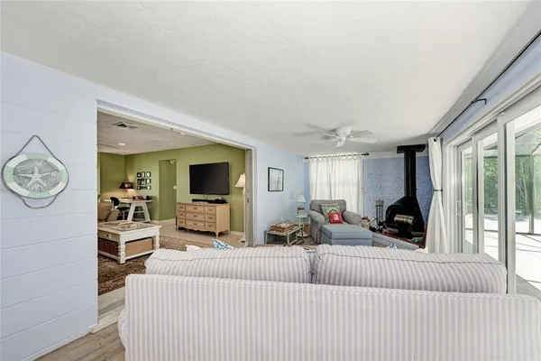 a view of swimming pool with a patio