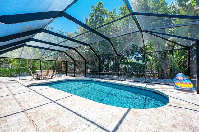 a house with palm tree in front of it
