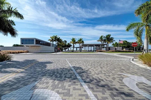 a view of a backyard with table and chairs