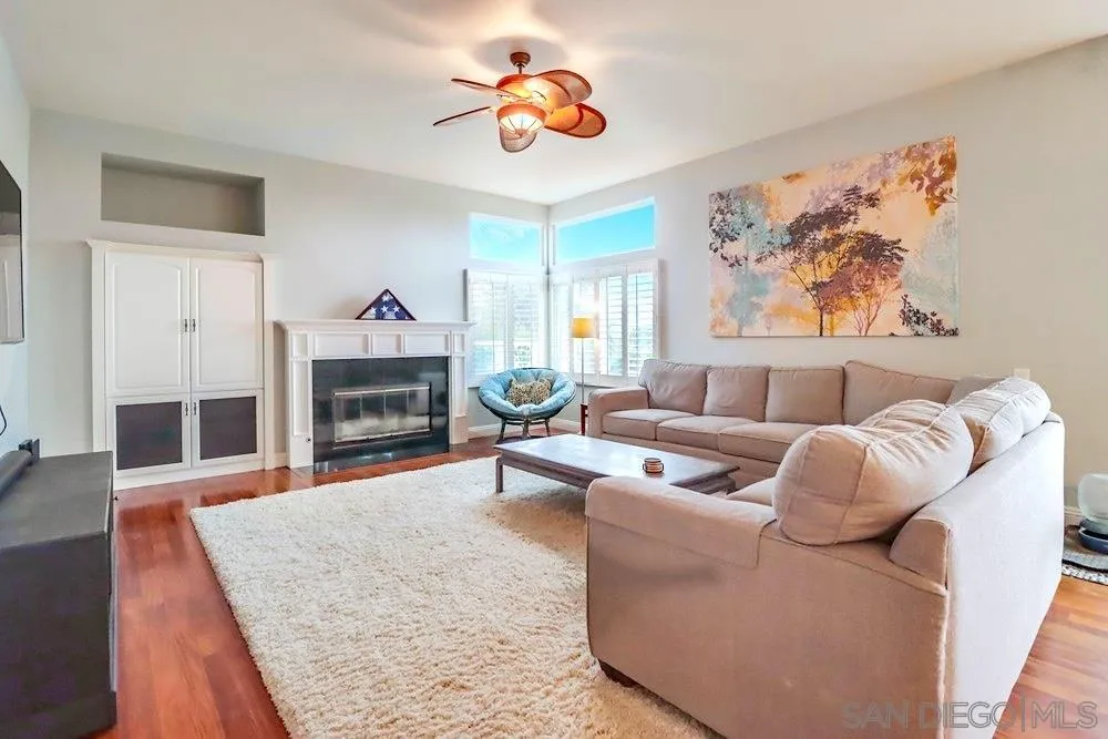 3646 Hidden Ridge Road Jamul, CA 91935 - Photo 8 of 43 a living room with furniture and a fireplace