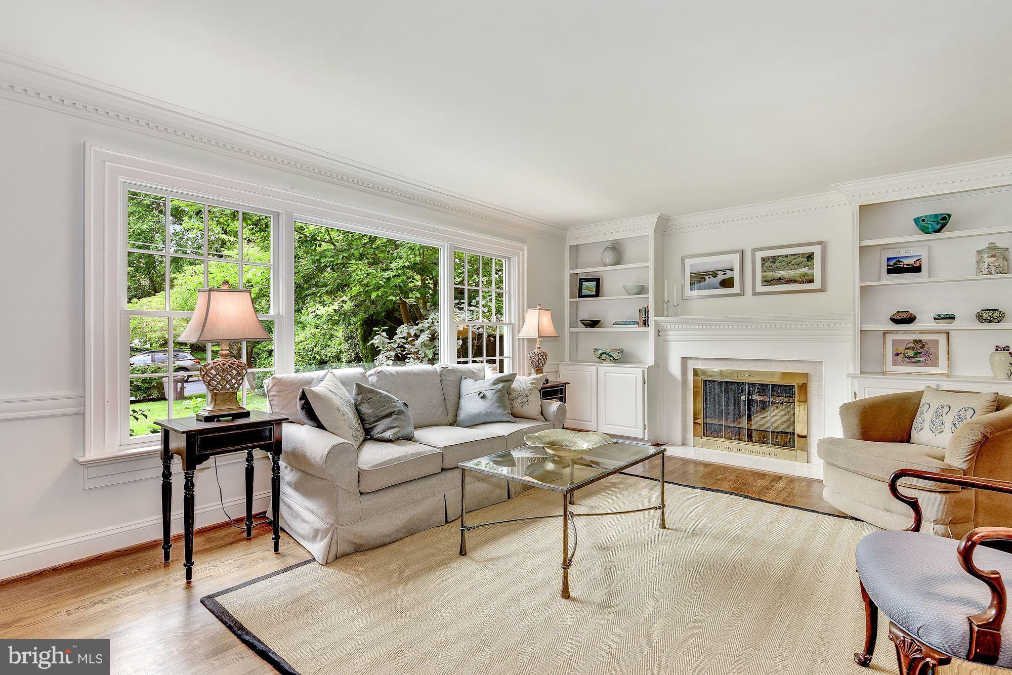 5613 Newington Road Bethesda, MD 20816 - Photo 2 of 17 Living Room with built-ins and fireplace