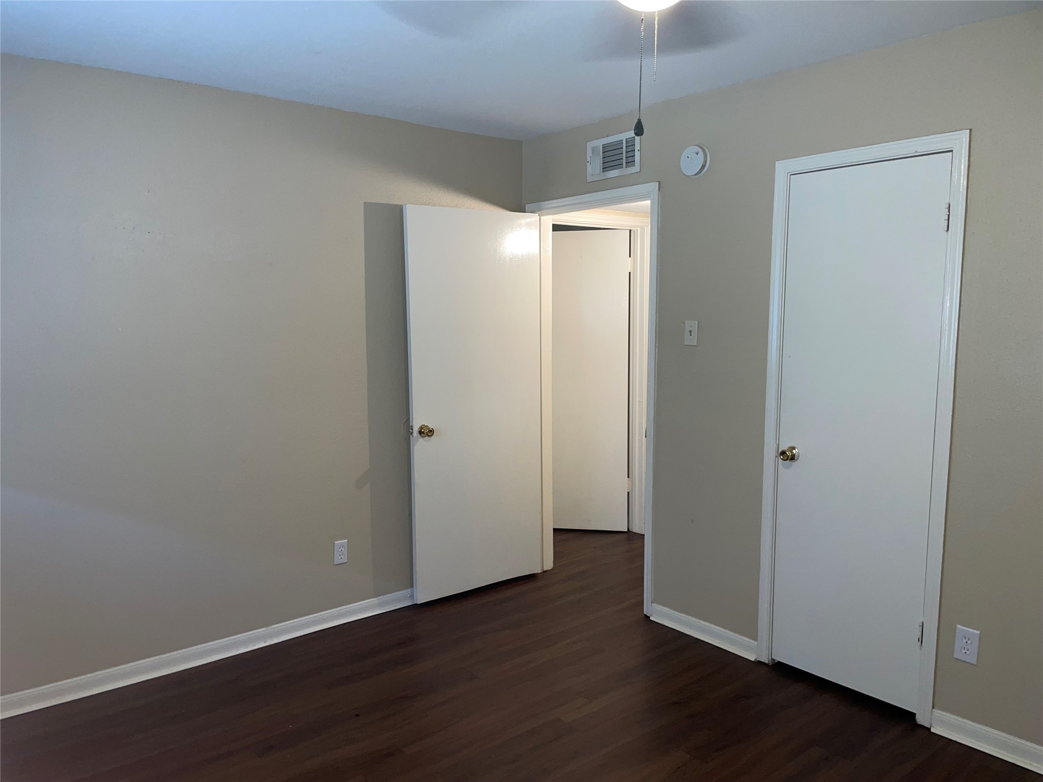4710 Airport Boulevard, Unit 206 Houston, TX 77048 - Photo 15 of 17 a view of an empty room with wooden floor and a window