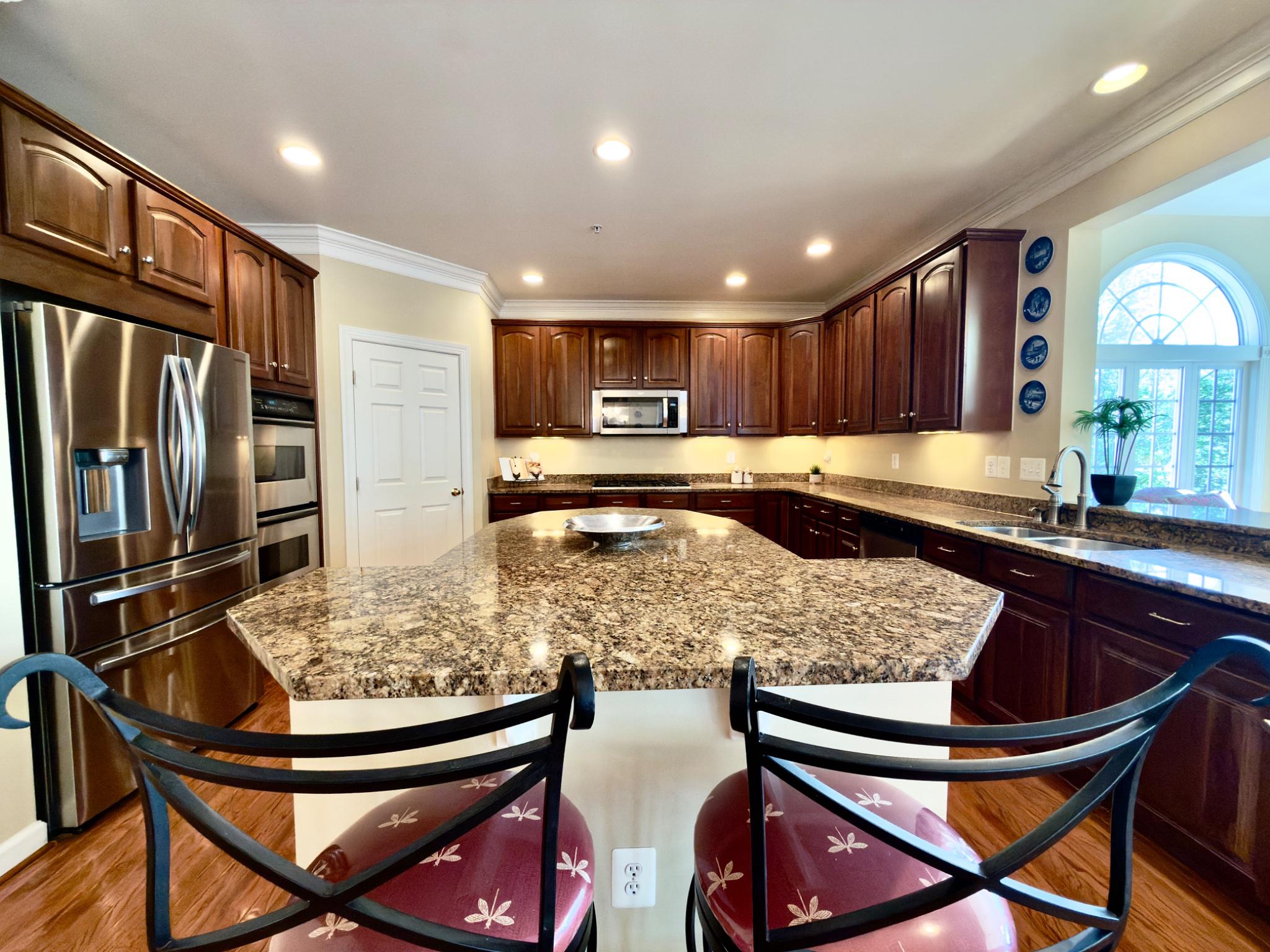 14140 Seneca Road Darnestown, MD 20874 - Photo 31 of 78 Elegant kitchen with rich cabinetry.