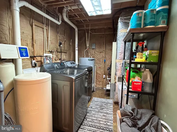 a storage room with washer and dryer