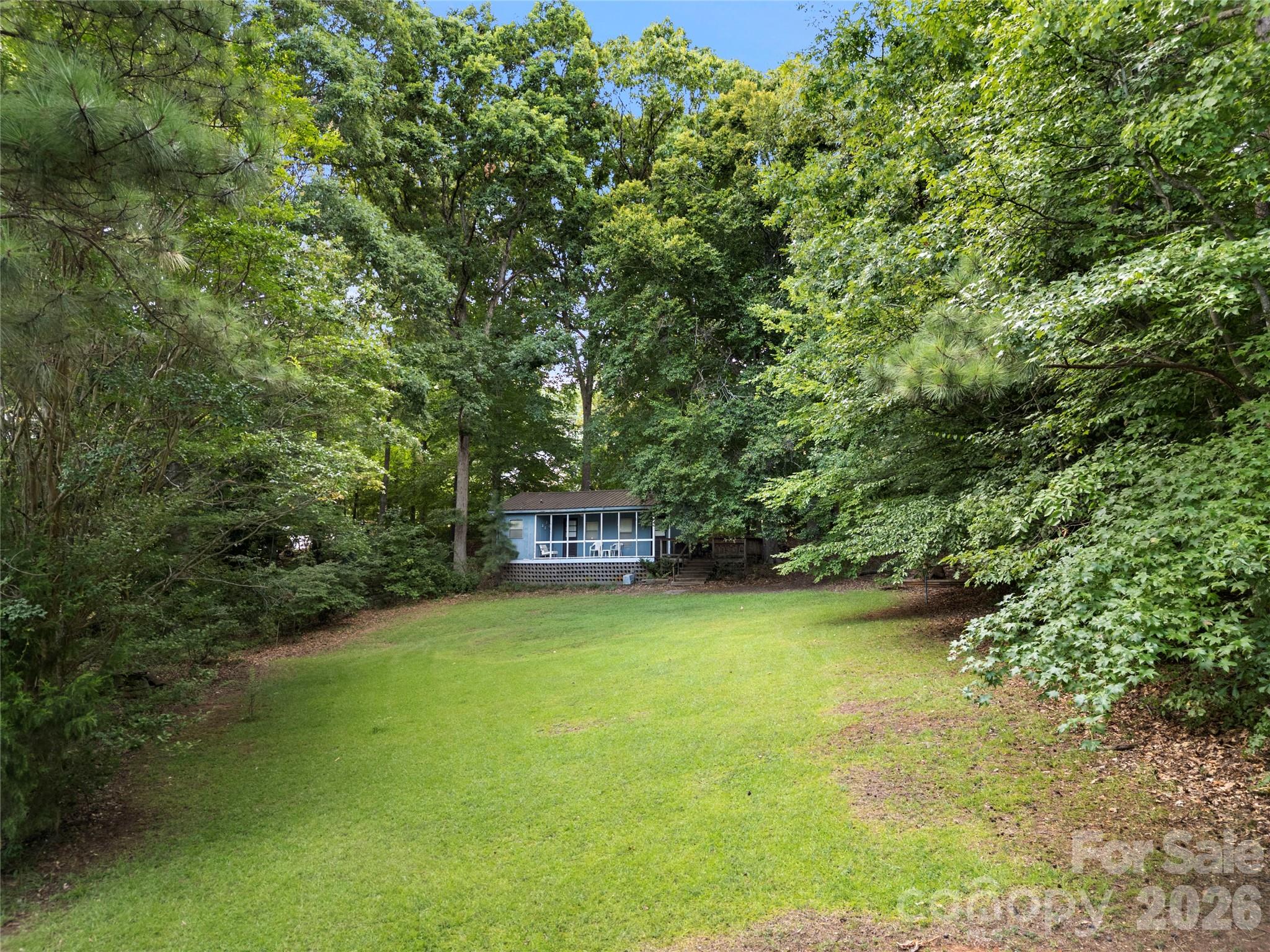 3766 Gordon Street, Unit 48 Terrell, NC 28682 - Photo 12 of 16 a view of a mini refrigerator with a yard