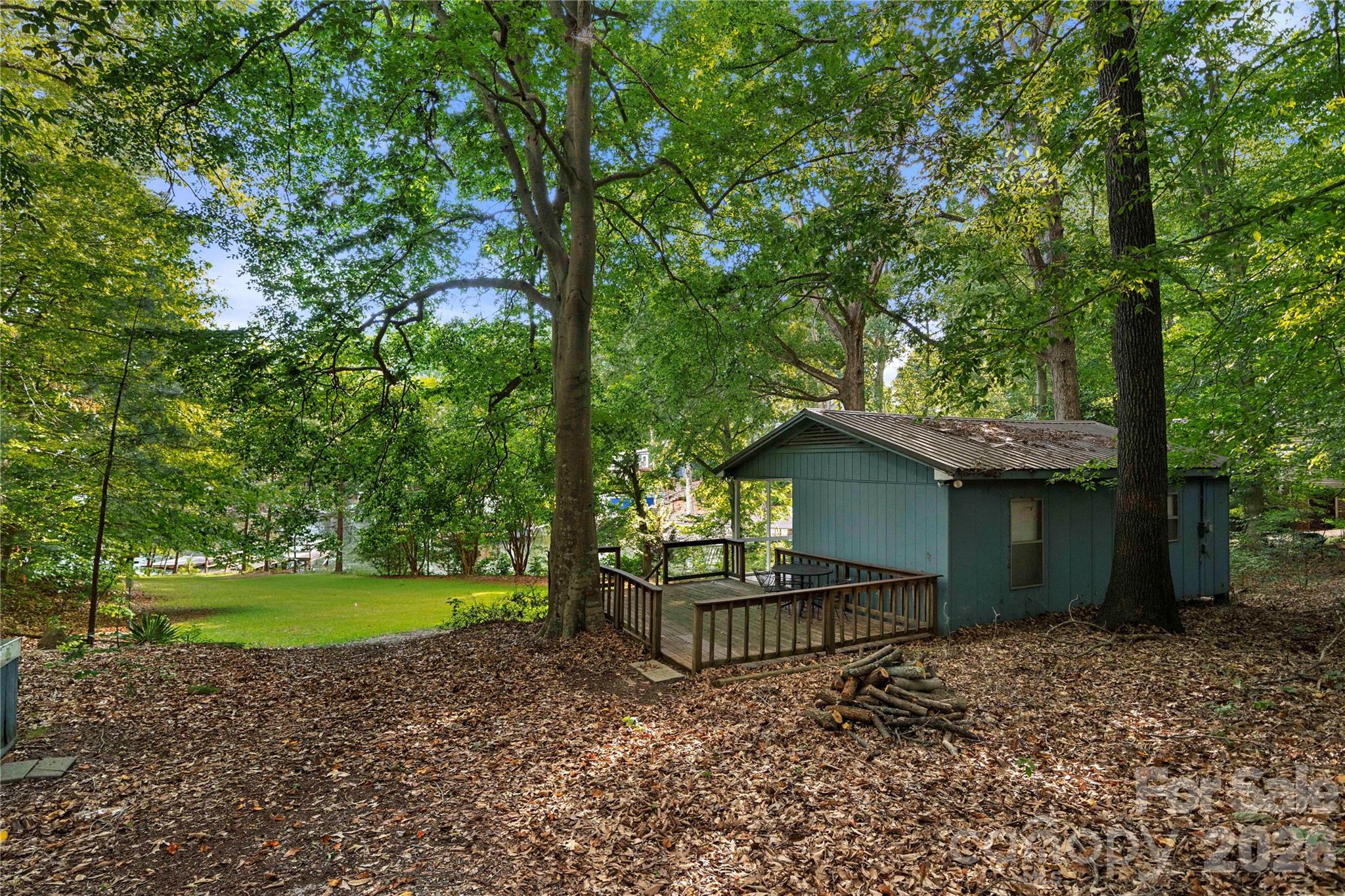 3766 Gordon Street, Unit 48 Terrell, NC 28682 - Photo 15 of 16 a view of a house with a yard and large trees