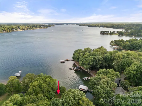 a view of a lake with a yard