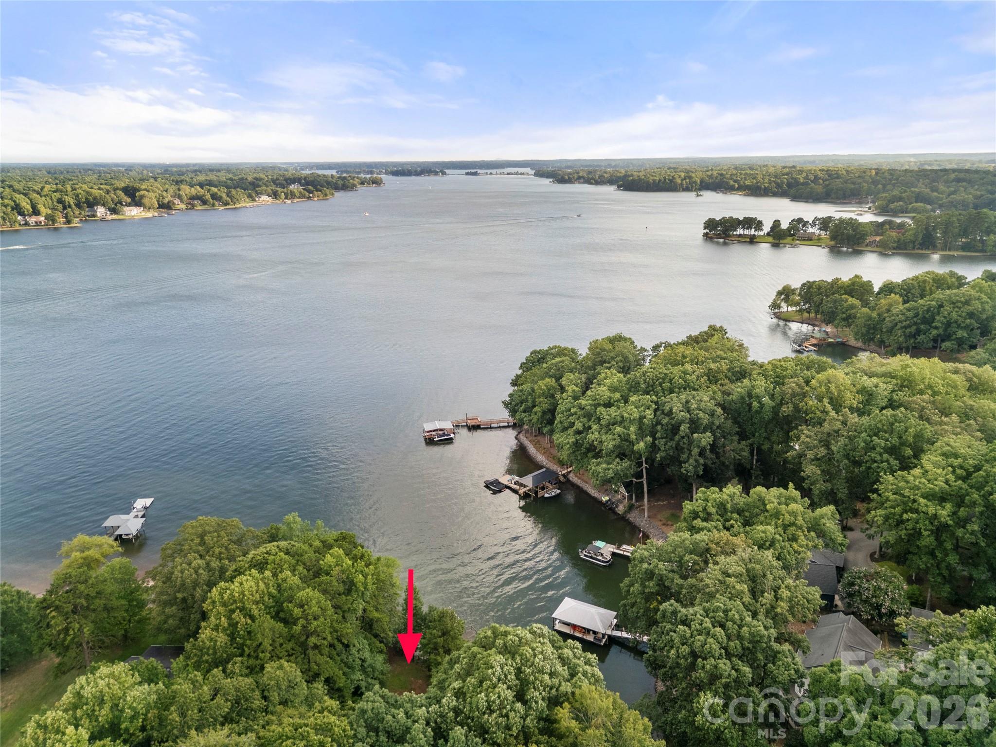 3766 Gordon Street, Unit 48 Terrell, NC 28682 - Photo 3 of 16 a view of a lake with a yard