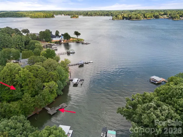 a view of a lake with outdoor space and seating space