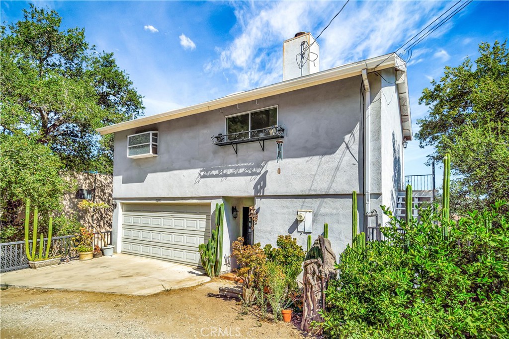 22011 Callado Way Topanga, CA 90290 - Photo 23 of 49 a view of a house with a garage