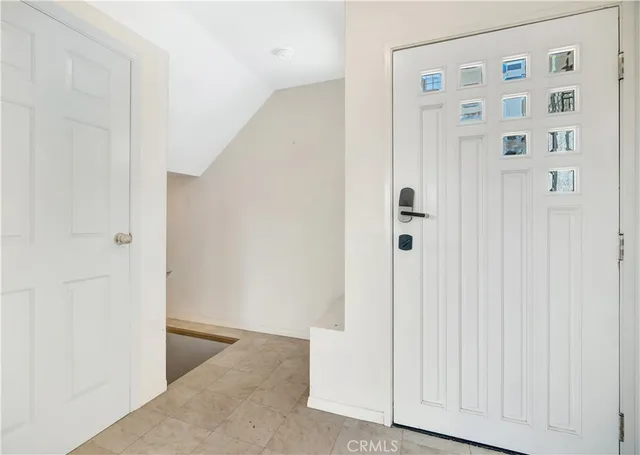 a view of a hallway with closet