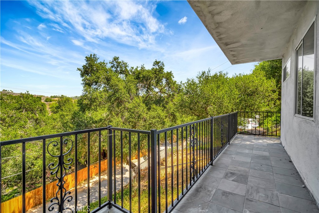 22011 Callado Way Topanga, CA 90290 - Photo 34 of 49 a view of a balcony with a tree