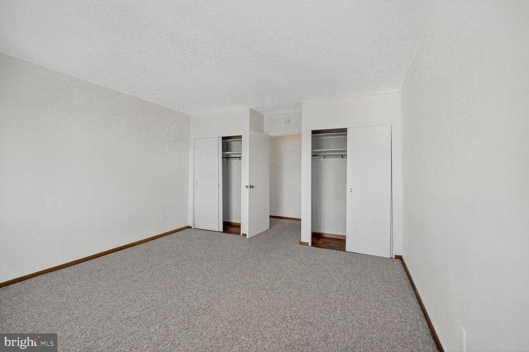 2475 Virginia Avenue Northwest, Unit 925 Washington, DC 20037 - Photo 19 of 45 a view of an empty room and closet area
