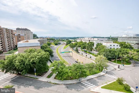 a view of a city with tall buildings