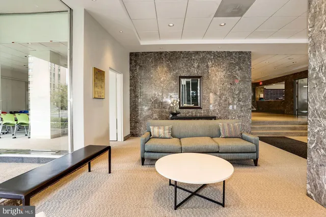 a view of an empty room with a fireplace