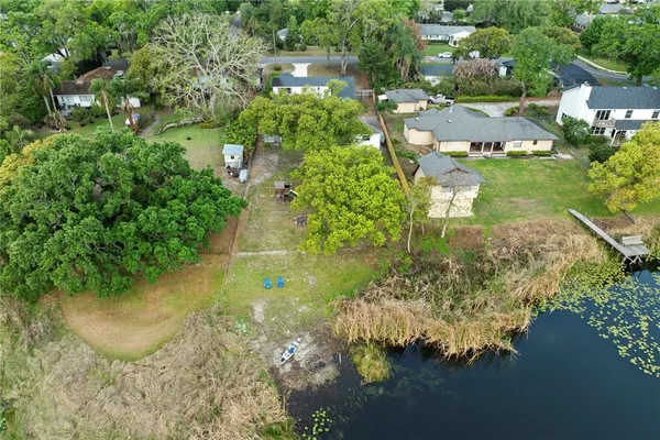 a view of a lake with a yard