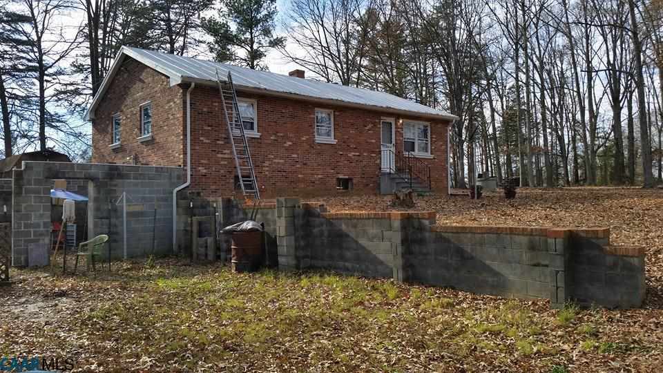 385 Fredericks Hall Road Bumpass, VA 23024 - Photo 24 of 27 a front view of a house with garage