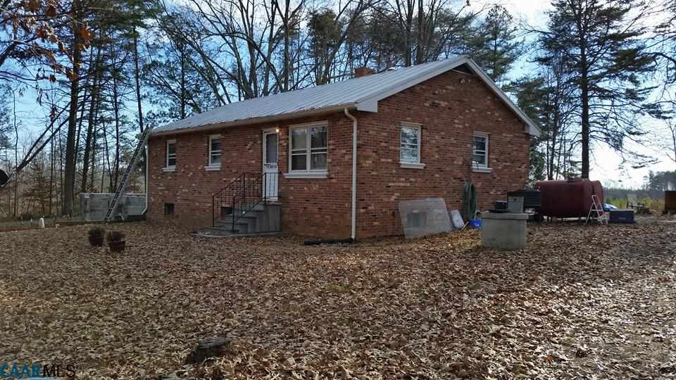 385 Fredericks Hall Road Bumpass, VA 23024 - Photo 26 of 27 a view of a house with a yard